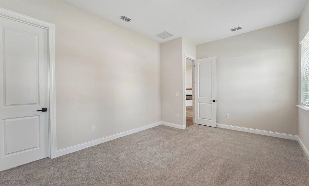 Just off the family room is a flex room perfect for a playroom or an office
