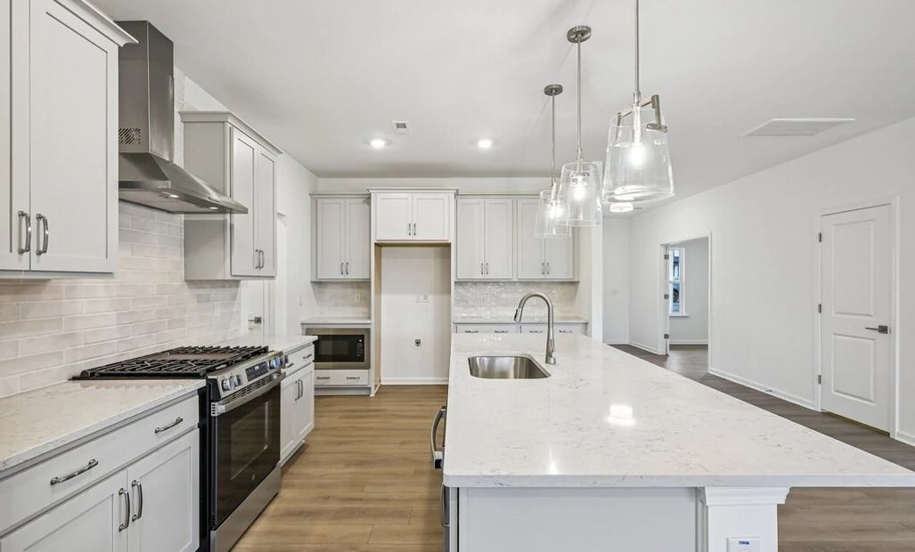 Kitchen featuring the AW Collection® Milan - Chic gray finishes and smooth surfaces shine.