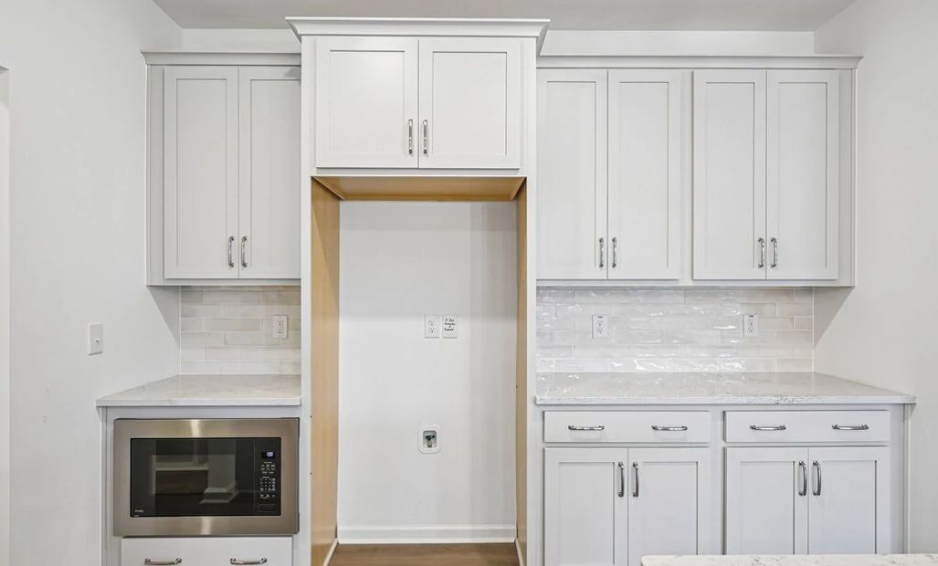 Kitchen featuring the AW Collection® Milan - Chic gray finishes and smooth surfaces shine.