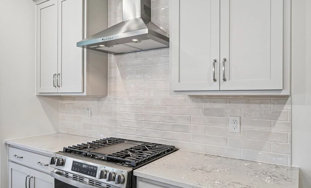 Kitchen featuring the AW Collection® Milan - Chic gray finishes and smooth surfaces shine.