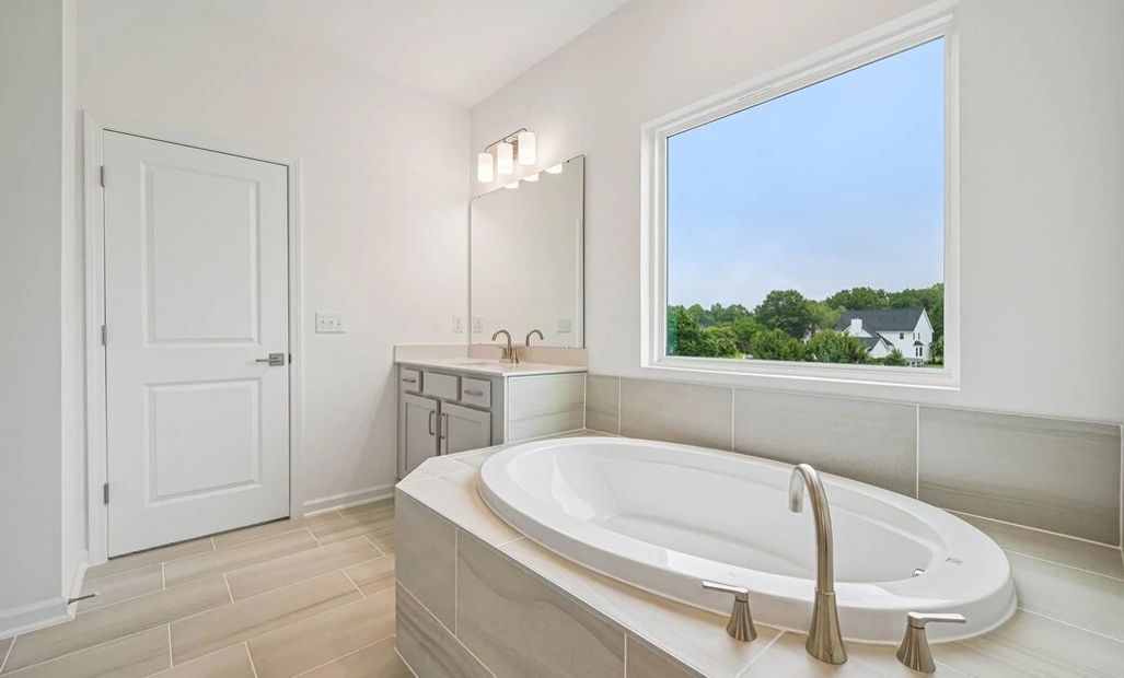 Primary Bath featuring the AW Collection® Milan - Clean geometry and high-contrast finishes.