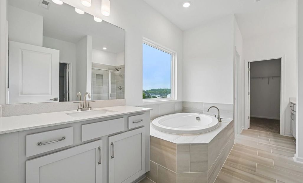 Primary Bath featuring the AW Collection® Milan - Clean geometry and high-contrast finishes.