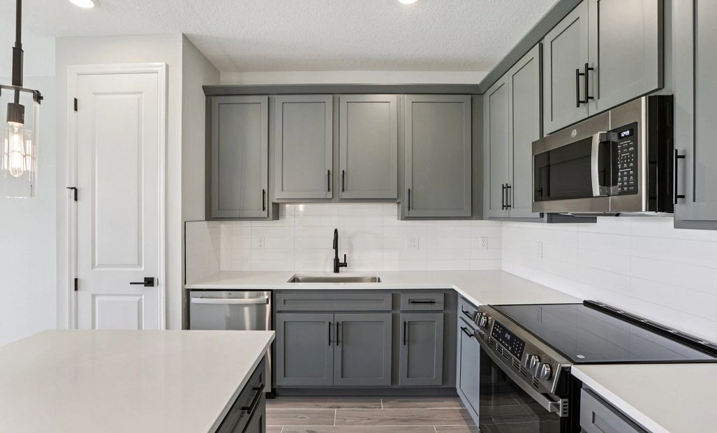 Spacious kitchen layout featuring AW Collection® Minimalist - Representative images and renderings