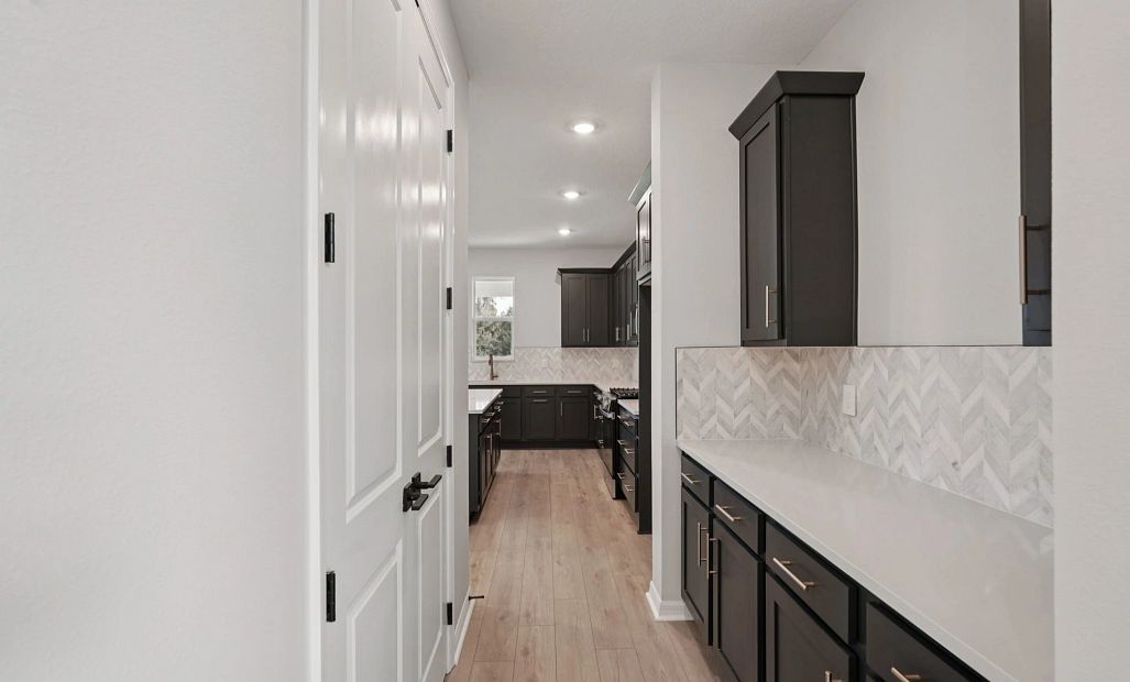 Butler's pantry connecting the dining room and kitchen - representative image this home will feature