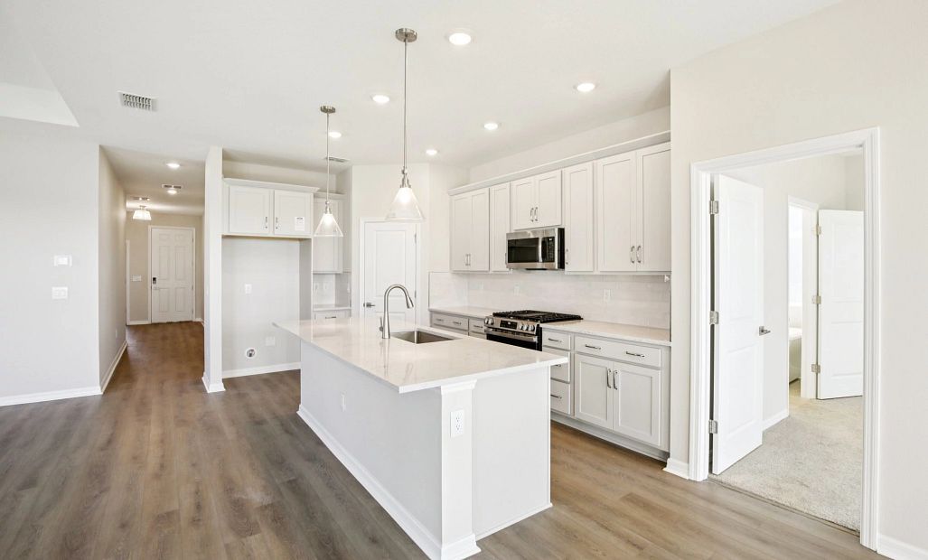 Kitchen with a large island - Representative images and renderings are for illustrative purposes