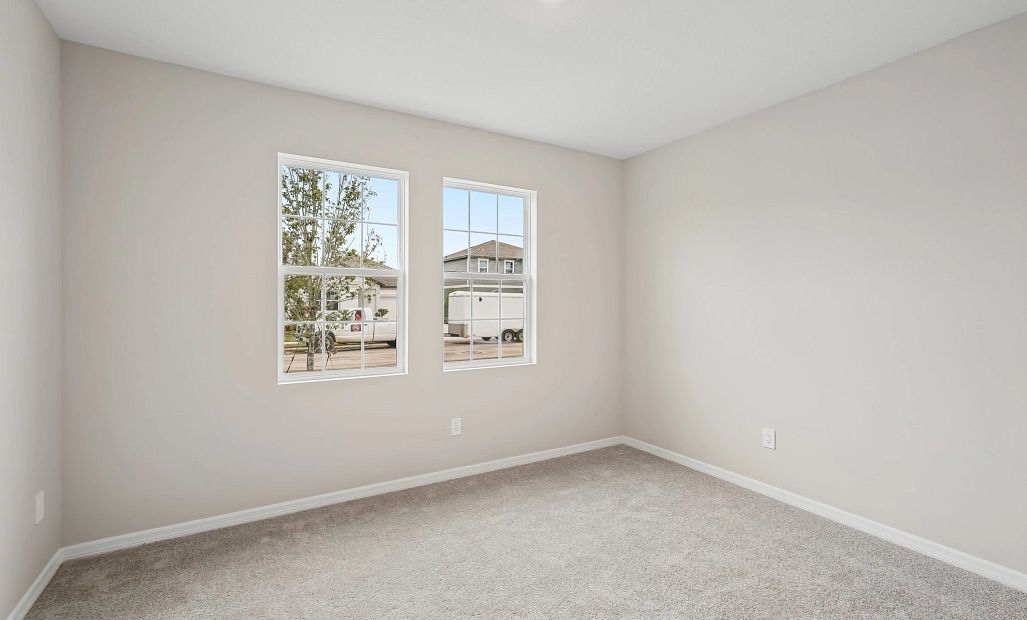 Bedroom 2 located at the front of the home