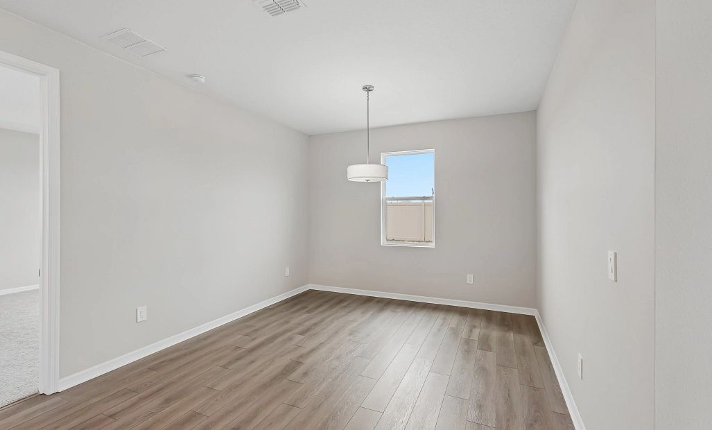 Dining nook located just of the kitchen