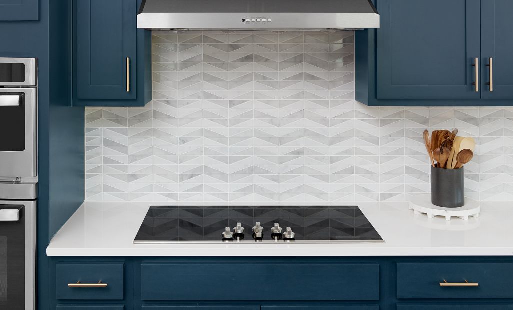 Close up of the AW Collection® Sapphire with the flat top range and vent hood - Representative