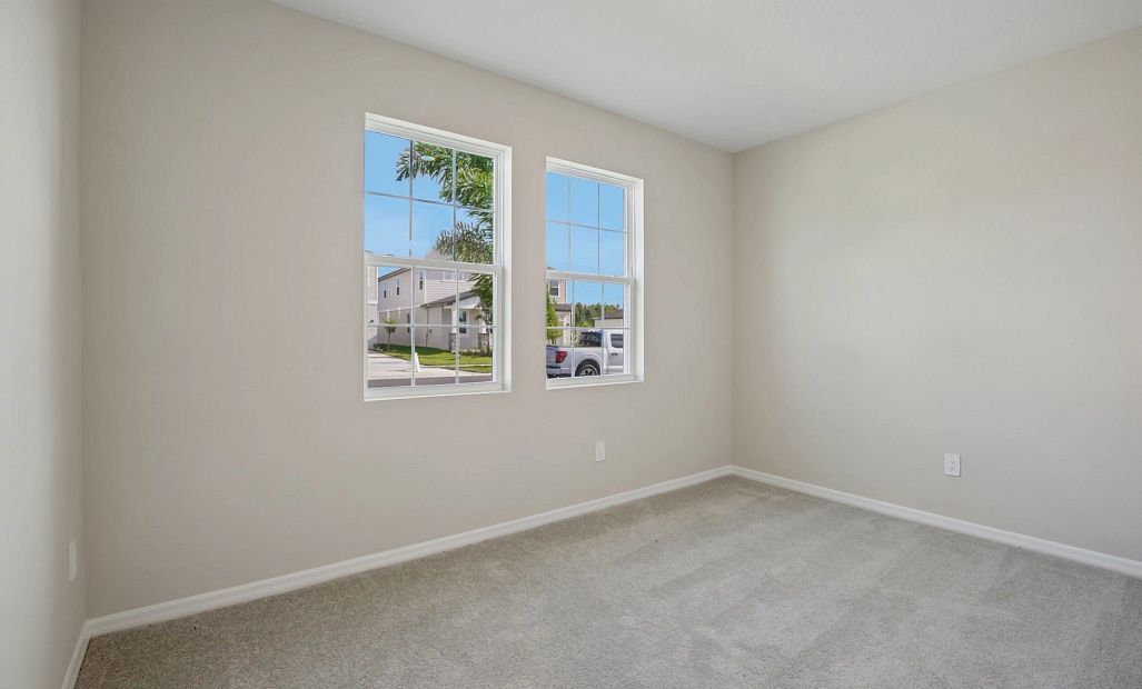 Bedroom 3 located at the front of the home - Representative images and renderings are for