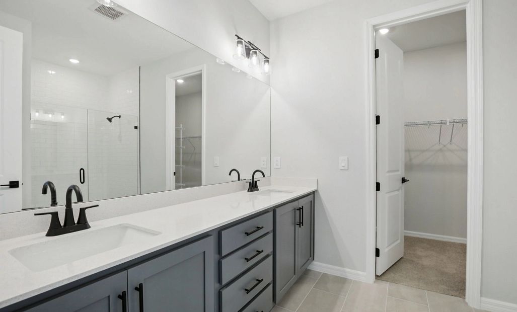 Primary bathroom with double sinks and a walk-in shower will feature aspects of AW Collection®