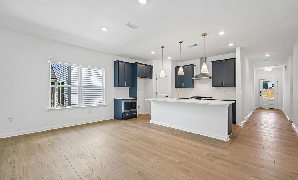 Kitchen featuring the AW Collection® Sapphire - Vibrant blues and crisp whites steal the show.