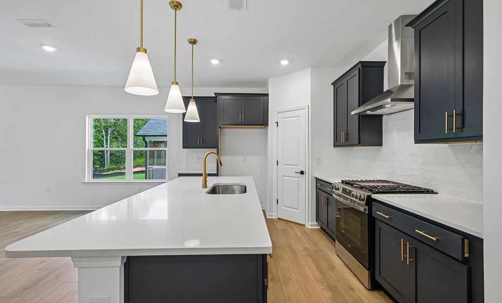Kitchen featuring the AW Collection® Sapphire - Vibrant blues and crisp whites steal the show.