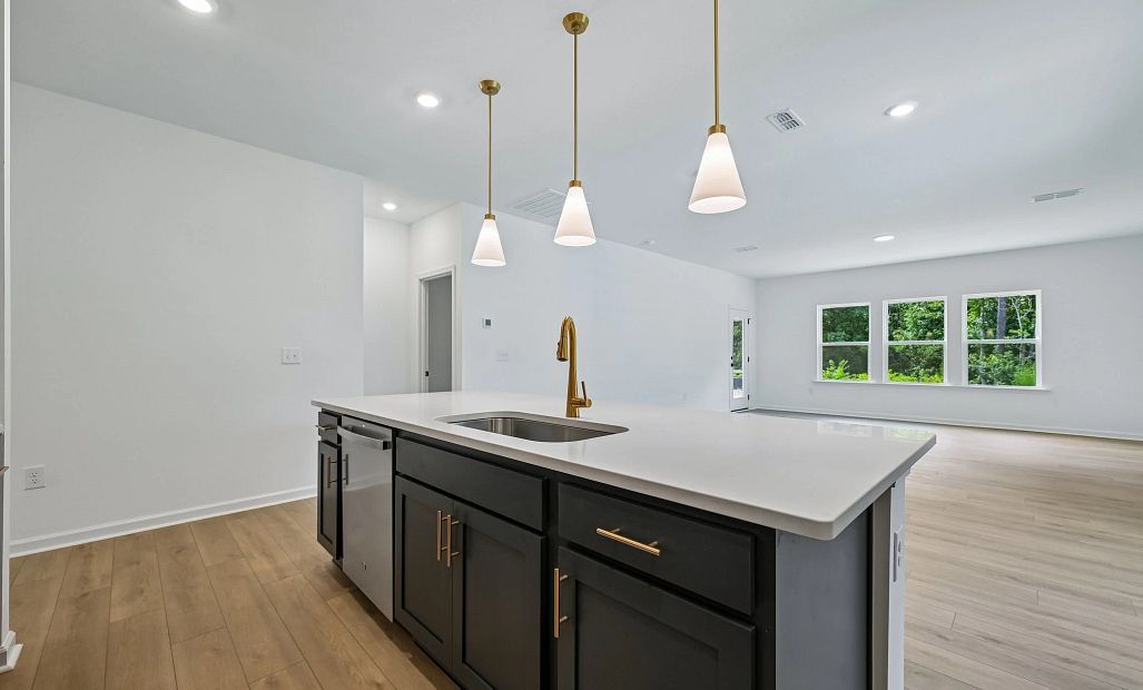 Kitchen featuring the AW Collection® Sapphire - Vibrant blues and crisp whites steal the show.
