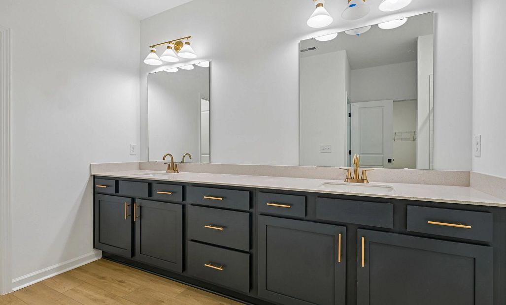Primary Bath featuring the AW Collection® Sapphire - Clean white and cool hues define the space.
