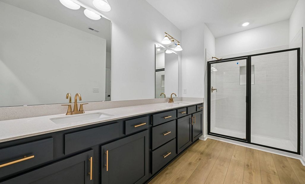 Primary Bath featuring the AW Collection® Sapphire - Clean white and cool hues define the space.