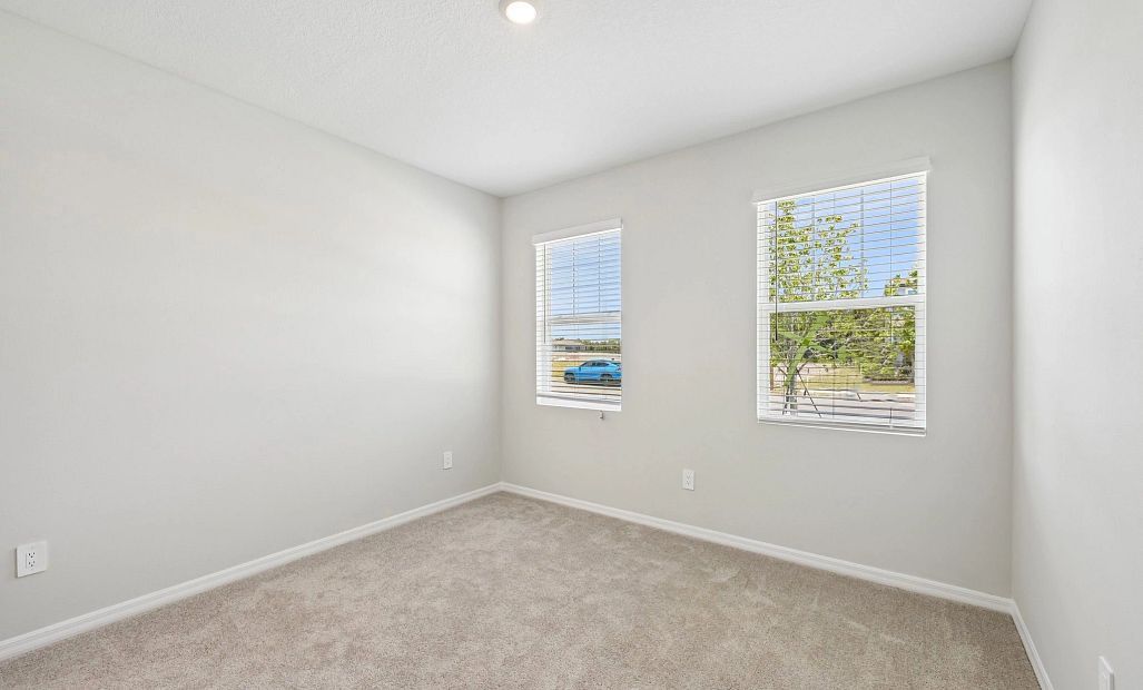 Guest suite located at the front of the home off the foyer - Representative images and renderings