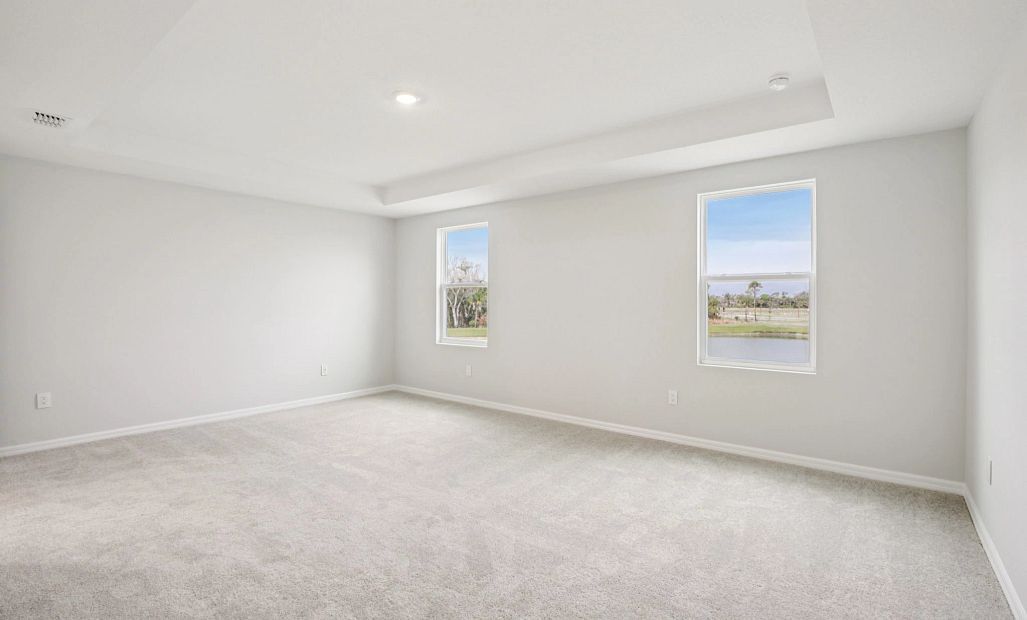 Primary bedroom features a tray ceiling - Representative images and renderings are for illustrative