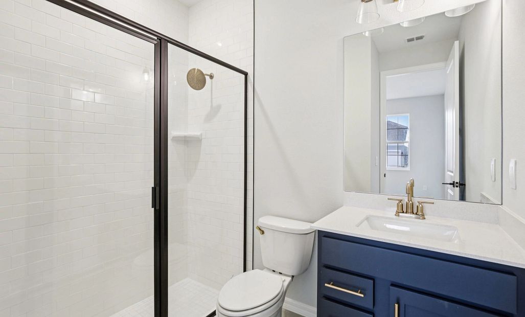 Bathroom connected to bedroom 4 features a walk-in shower and will showcase AW Collection® Serene -