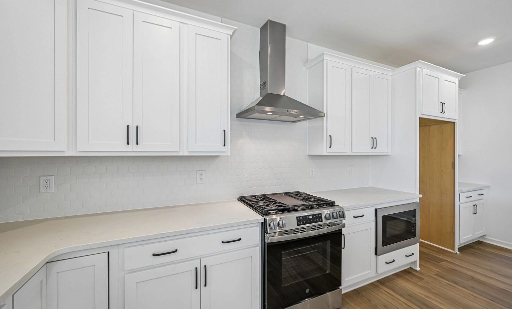 Kitchen featuring the AW Collection® Harmony - Smooth finishes and classic touches shine.
