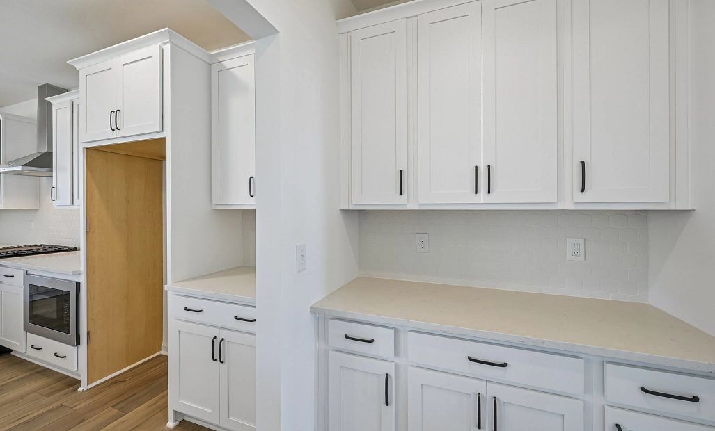 Butler’s Pantry featuring the AW Collection® Harmony - Classic storage with polished finishes.