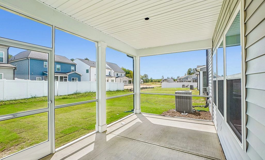 Screened-In Porch featuring the AW Collection® Timeless - A lovely spot to sip and unwind.