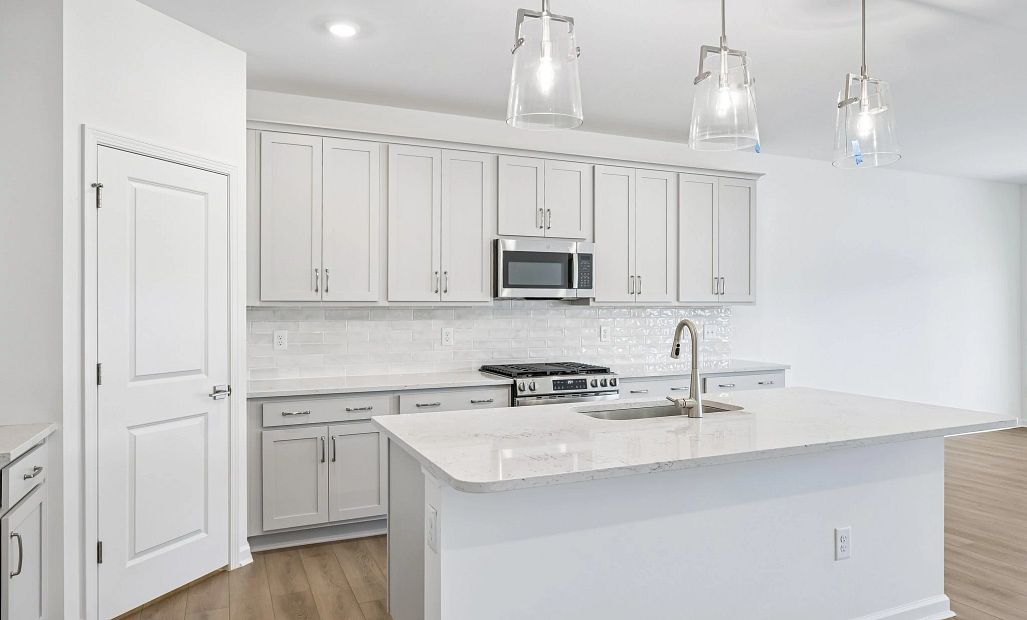 Kitchen featuring the AW Collection® Milan - Chic gray finishes and smooth surfaces shine.