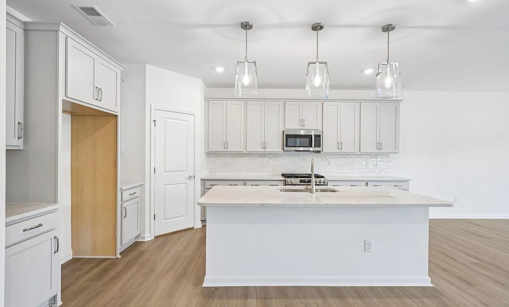Kitchen featuring the AW Collection® Milan - Chic gray finishes and smooth surfaces shine.