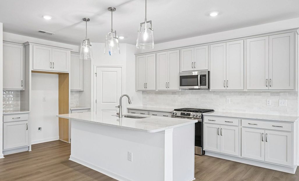 Kitchen featuring the AW Collection® Milan - Chic gray finishes and smooth surfaces shine.