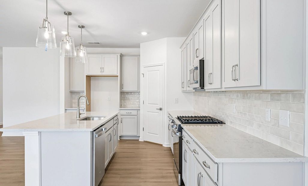 Kitchen featuring the AW Collection® Milan - Chic gray finishes and smooth surfaces shine.