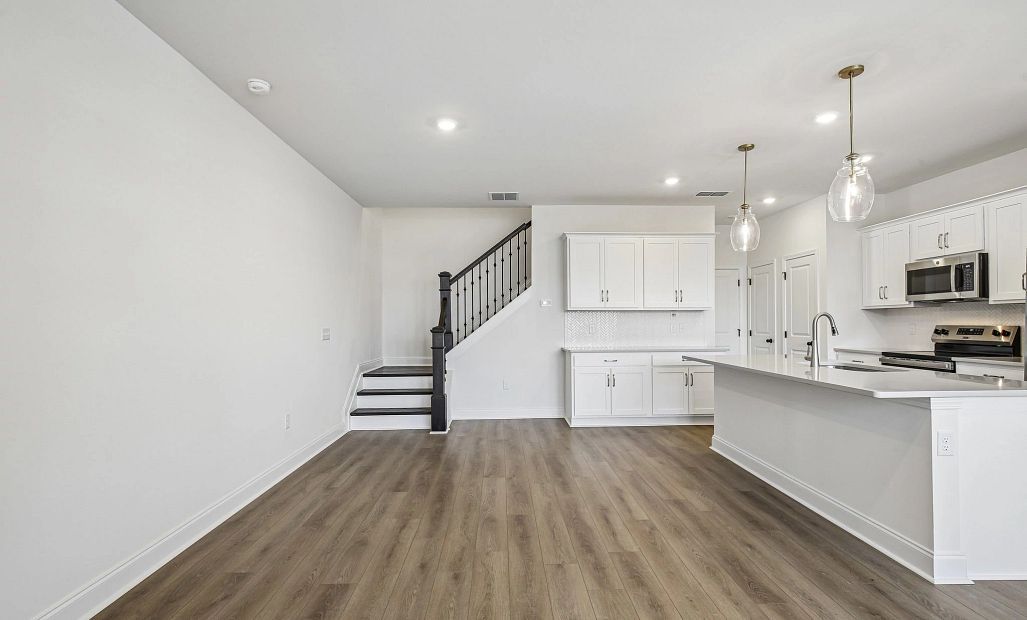 Dining Area & Hardwood Stairs