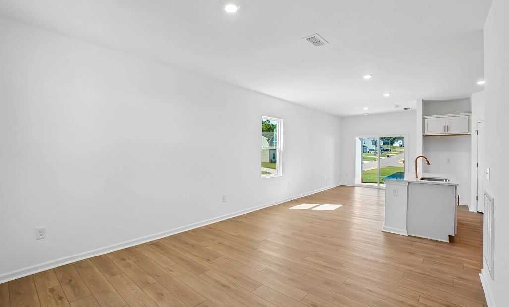 Family Room featuring the AW Collection® Serene - Open space with natural finishes and light.