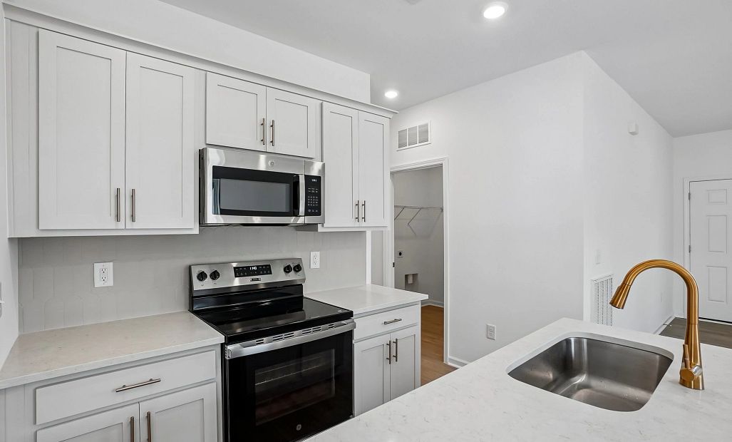 Kitchen featuring the AW Collection® Serene - Clean lines and earthy textures define the space.