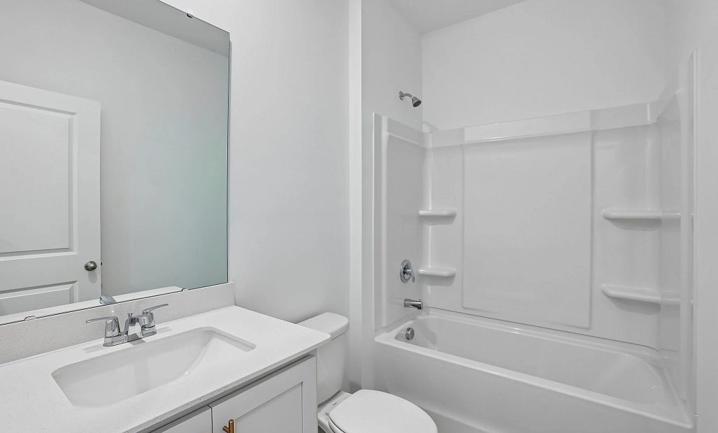 Bath 2 featuring the AW Collection® Serene - Earth-toned surfaces bring warmth and calm.