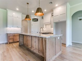 casa en Mustang Ridge por Quality Designed Homes