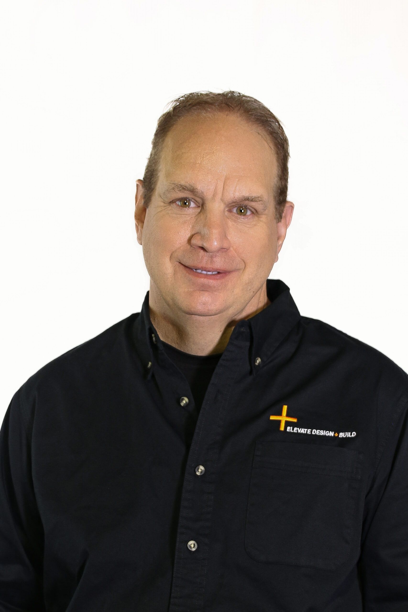 casa en Kansas City Custom Home Builder por Elevate Design + Build