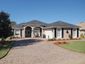 casa en T. E. James Custom Homes por T. E. James Custom Homes