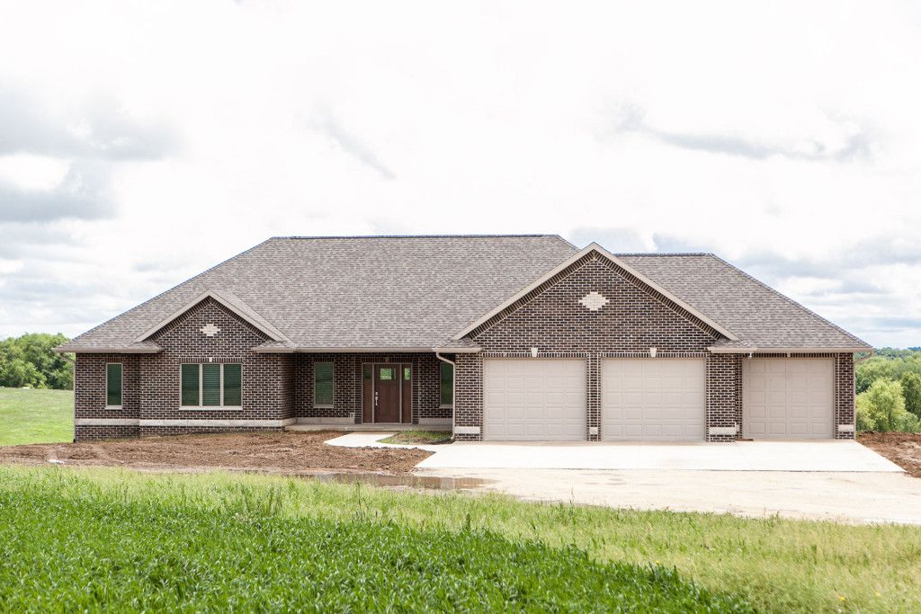 casa en Precision Builders por Precision Builders