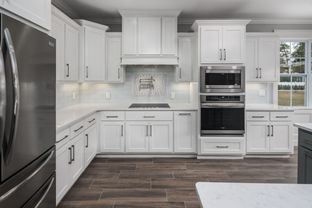 Kuhn Homes por Kuhn Homes en Greenville North Carolina