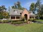 casa en Turning Leaf por John Henry Homes, Inc.