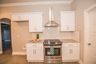 casa en AM Design & Construction Group por AM Design & Construction Group