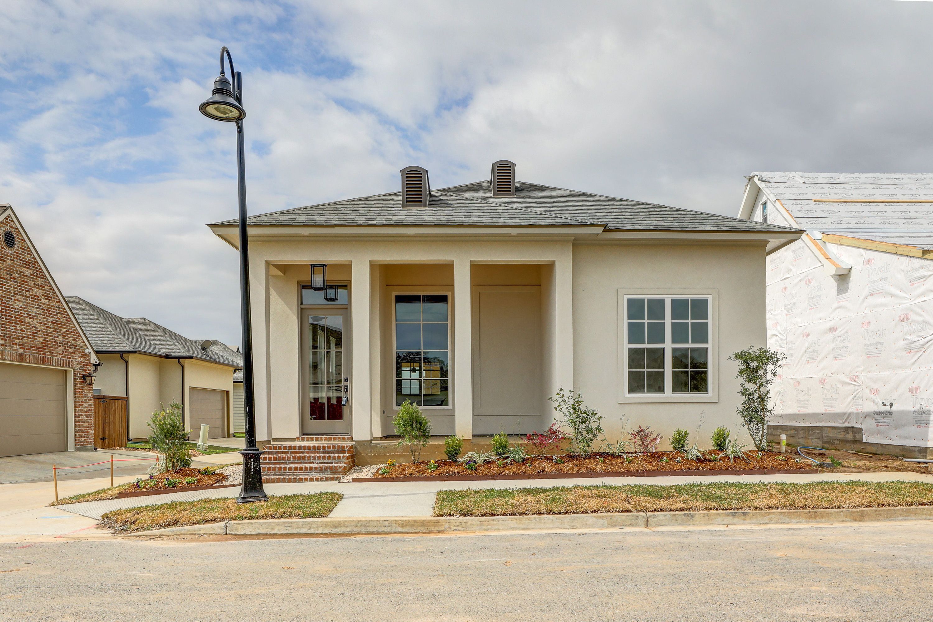 casa en AM Design & Construction Group por AM Design & Construction Group