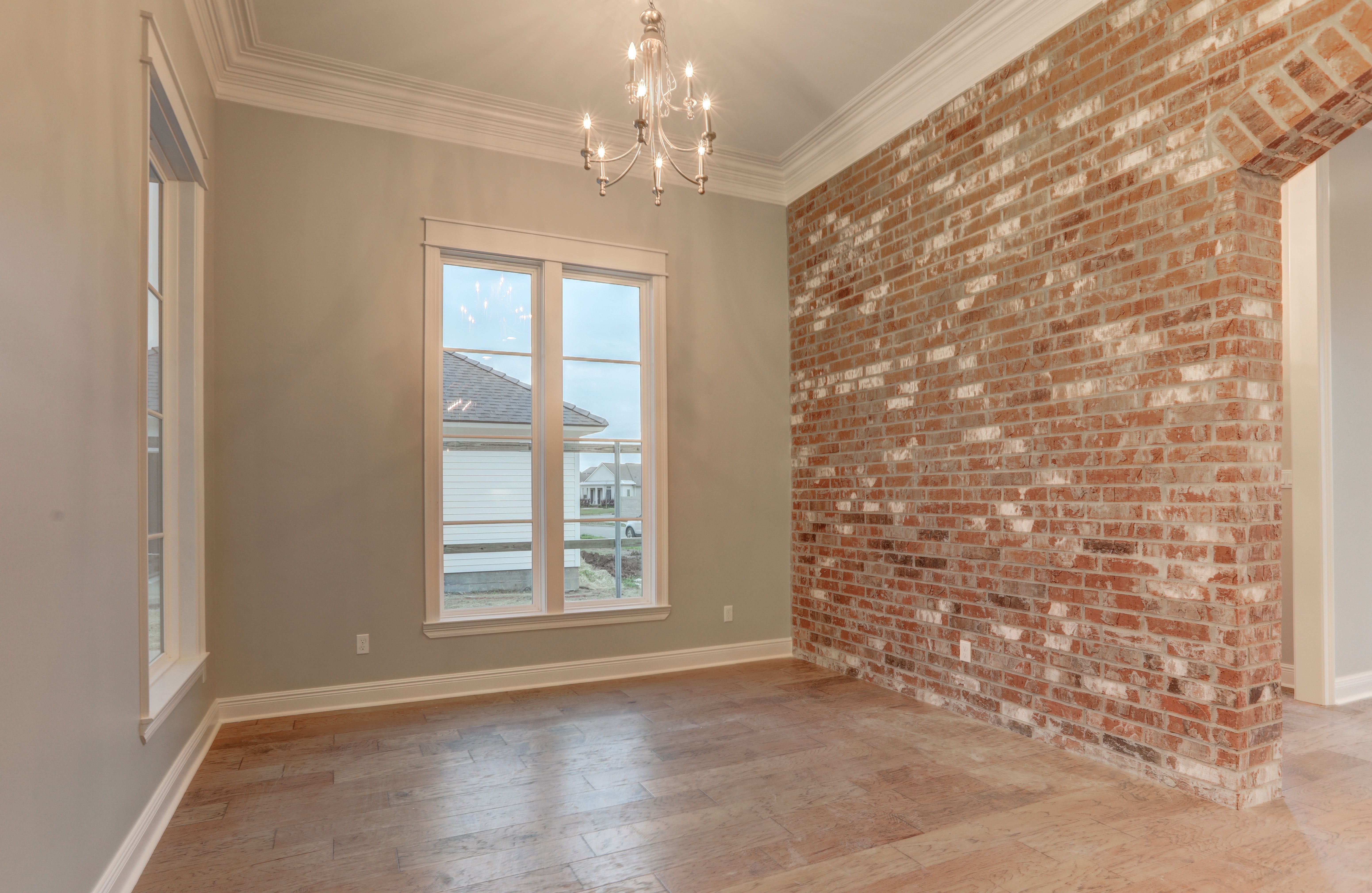 casa en AM Design & Construction Group por AM Design & Construction Group