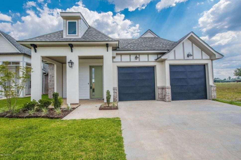 casa en AM Design & Construction Group por AM Design & Construction Group