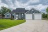 casa en AM Design & Construction Group por AM Design & Construction Group