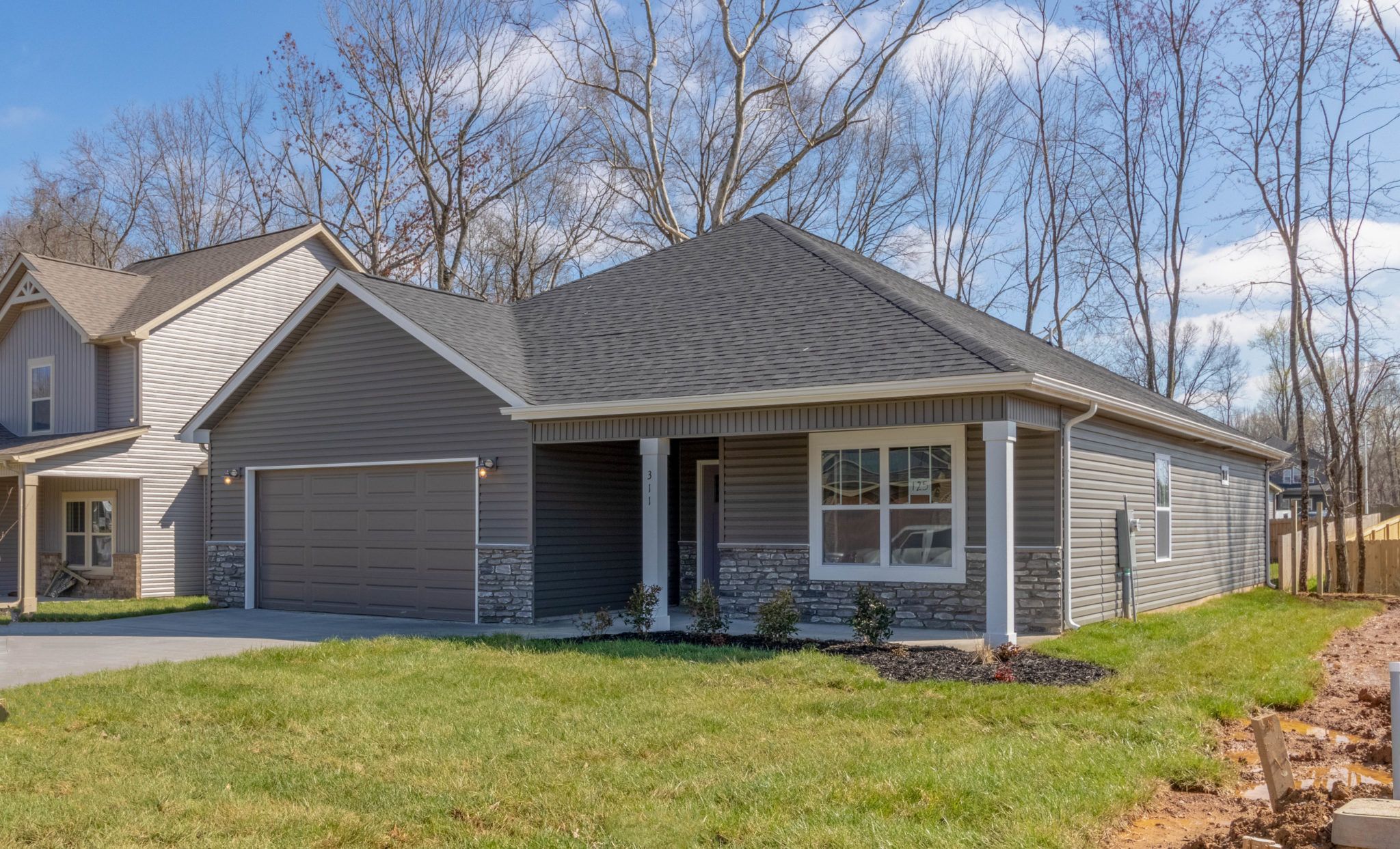 casa en The Quarry Townhomes Hawkins Homes LLC por Hawkins Homes LLC