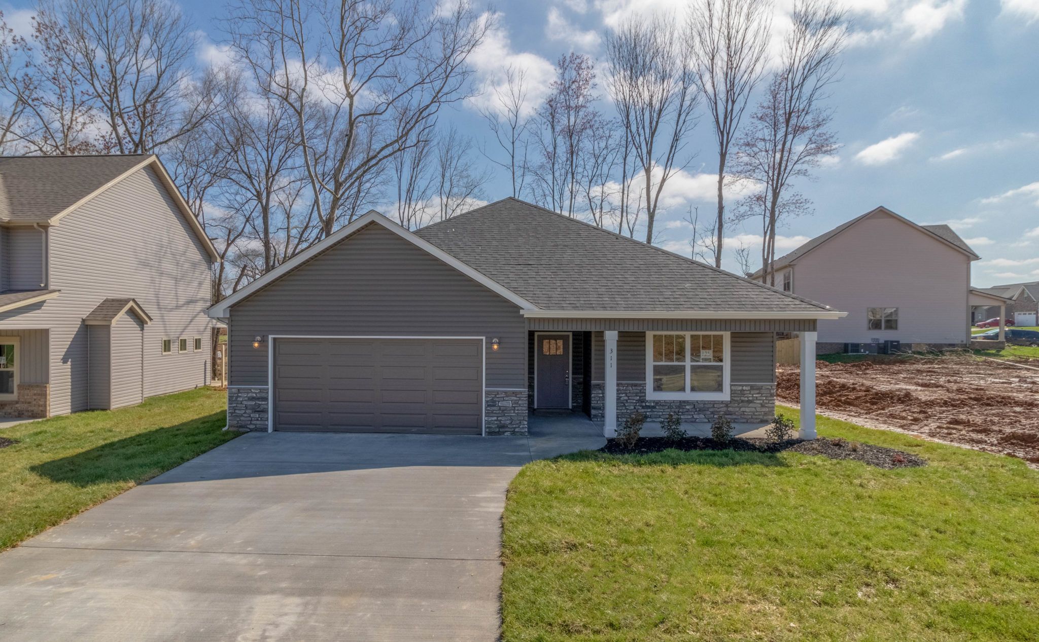 casa en The Quarry Townhomes Hawkins Homes LLC por Hawkins Homes LLC
