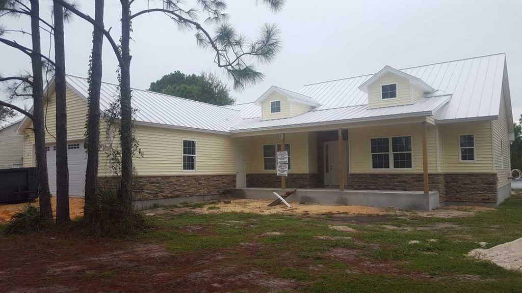 casa en T. E. James Custom Homes por T. E. James Custom Homes