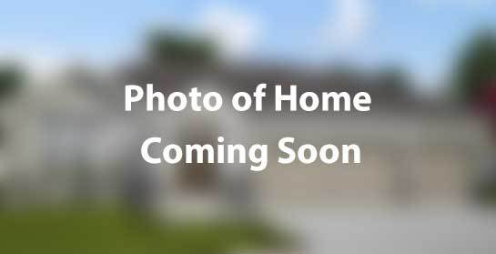 casa en Villas of Prairie Trails por Distinctive Home Builders