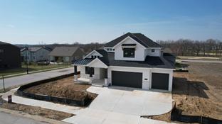 The Greens At Shoal Creek Valley por Rob Washam Homes en Kansas City Missouri