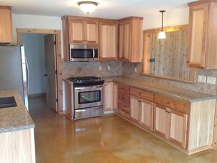 Hill Country Classics Custom Homes por Hill Country Classics Custom Homes en San Antonio Texas